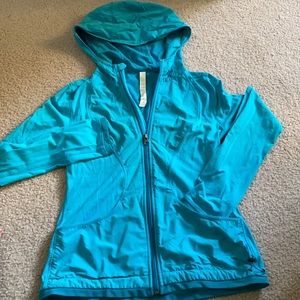Teal bride lululemon zip up with hood.